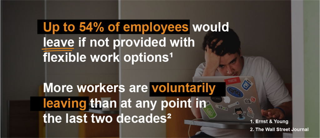 Distressed employee looking at his computer with his head in his hand